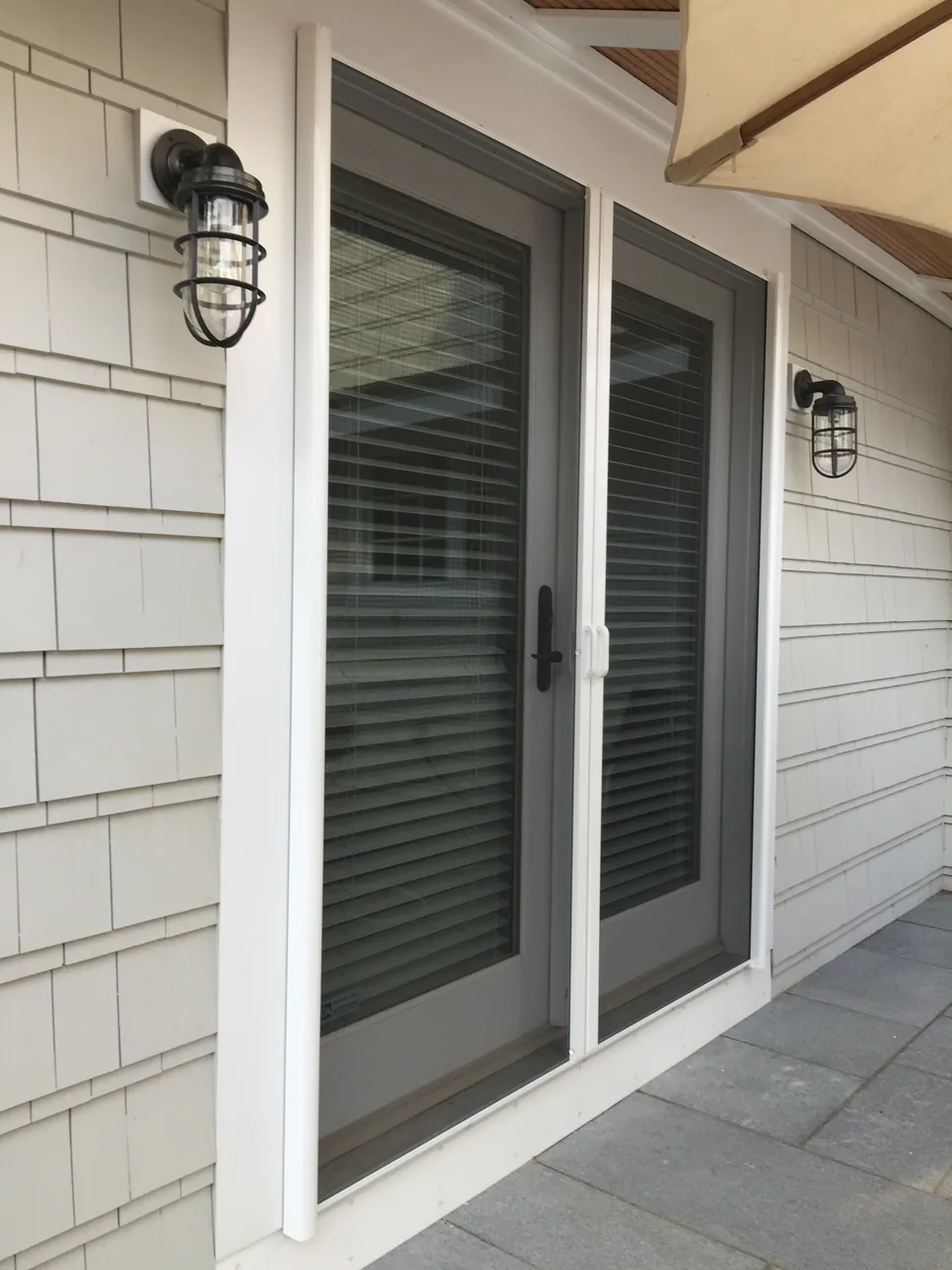 Retractable screens fitted to a pair of French doors