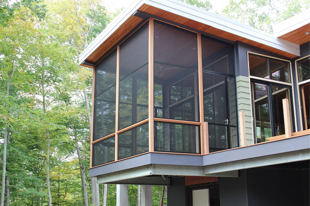 Screen Wall System panels forming a full enclosure elevation