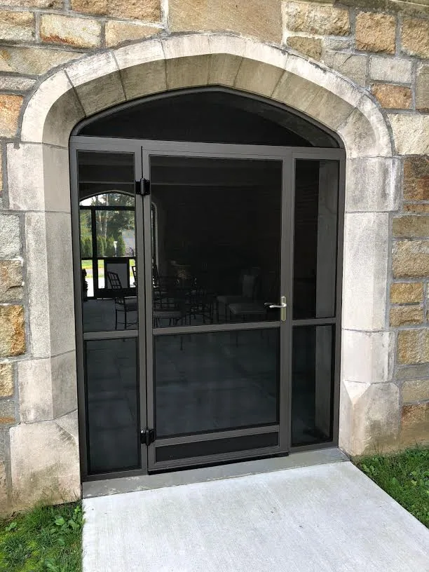 Screen Wall System enclosure with custom arched tops at a Bloomfield, Connecticut home, view 3