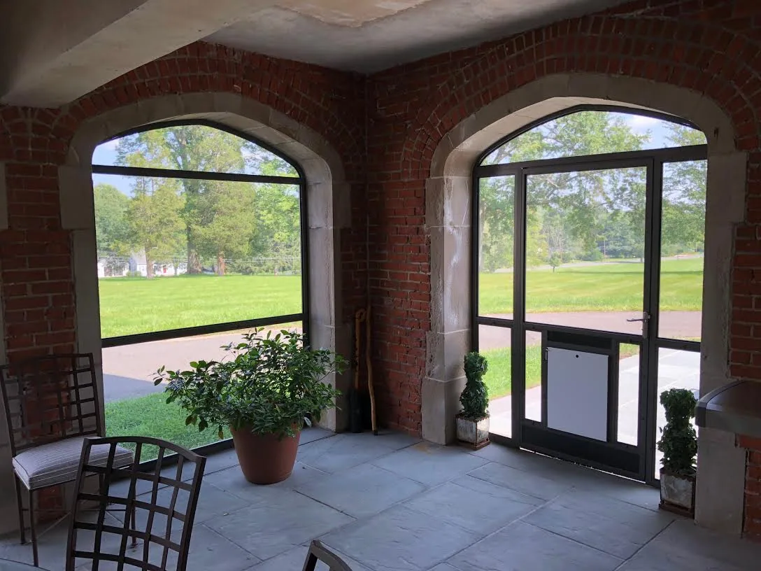 Screen Wall System enclosure with custom arched tops at a Bloomfield, Connecticut home, view 6
