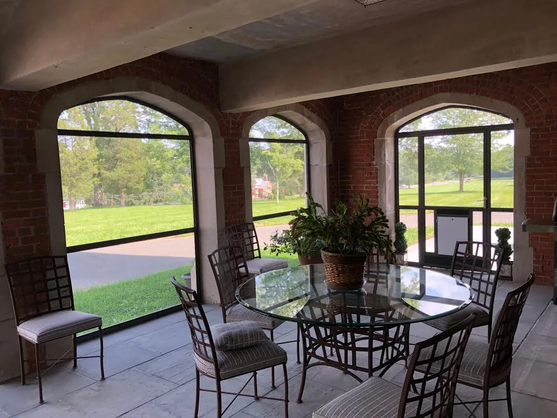 Screen Wall System enclosure with custom arched tops at a Bloomfield, Connecticut home, view 7