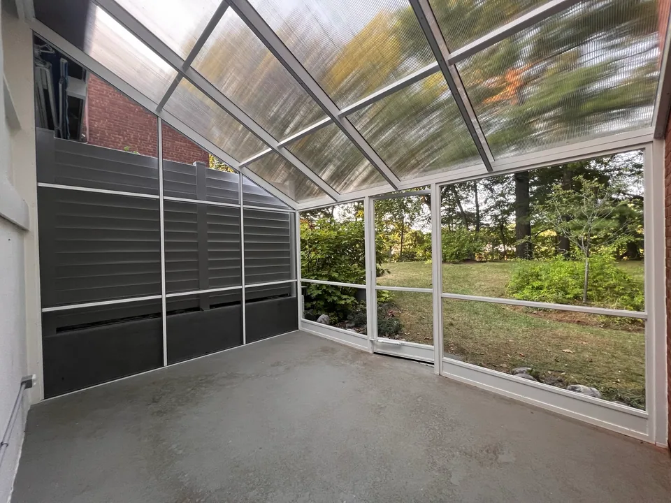 Finished screen enclosure viewed from the garden